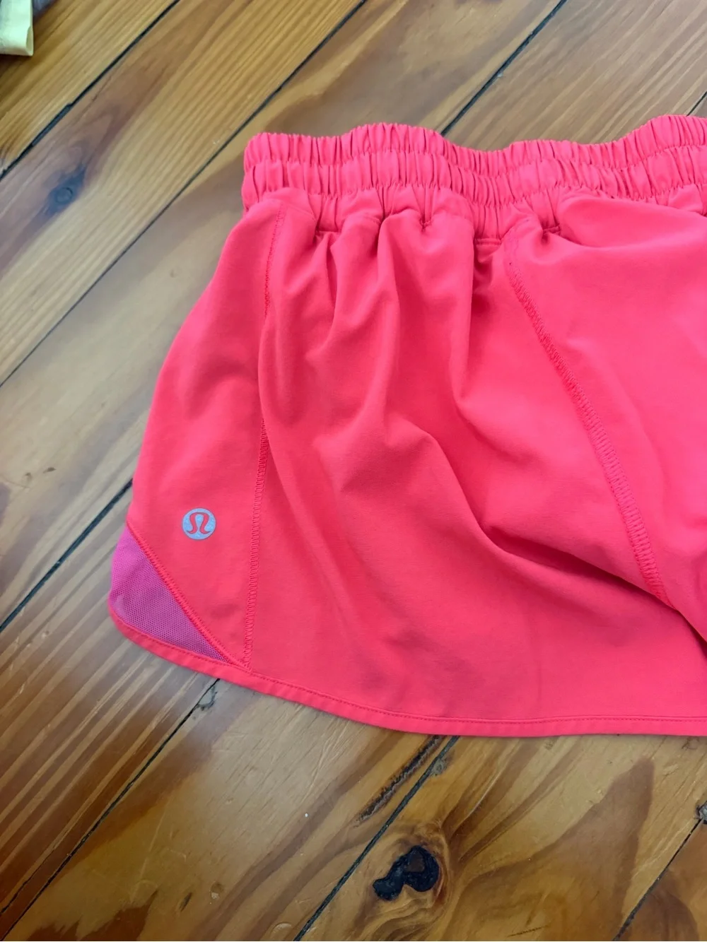 Lululemon womens size 4 2.5” Coral Pink Active Shorts